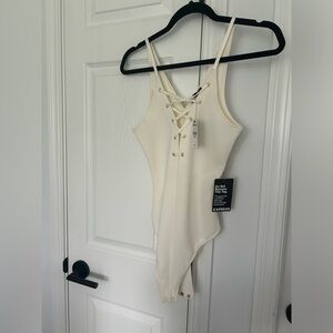 Cream express bodysuit XS
